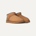 Pair of chestnut mini ankle boots at an angled front view