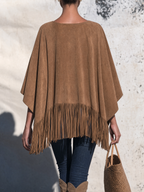 Wide sleeve and cape silhouette of the fringe poncho
