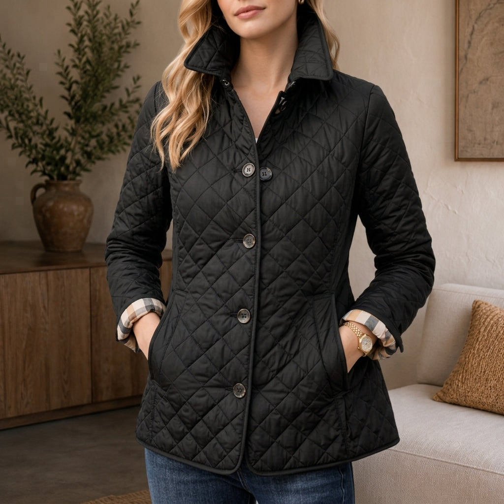 Women's quilted coat in Black, shown against a plain studio background