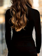 Black ribbed zip-neck turtleneck top for women, studio photo 2 of 7