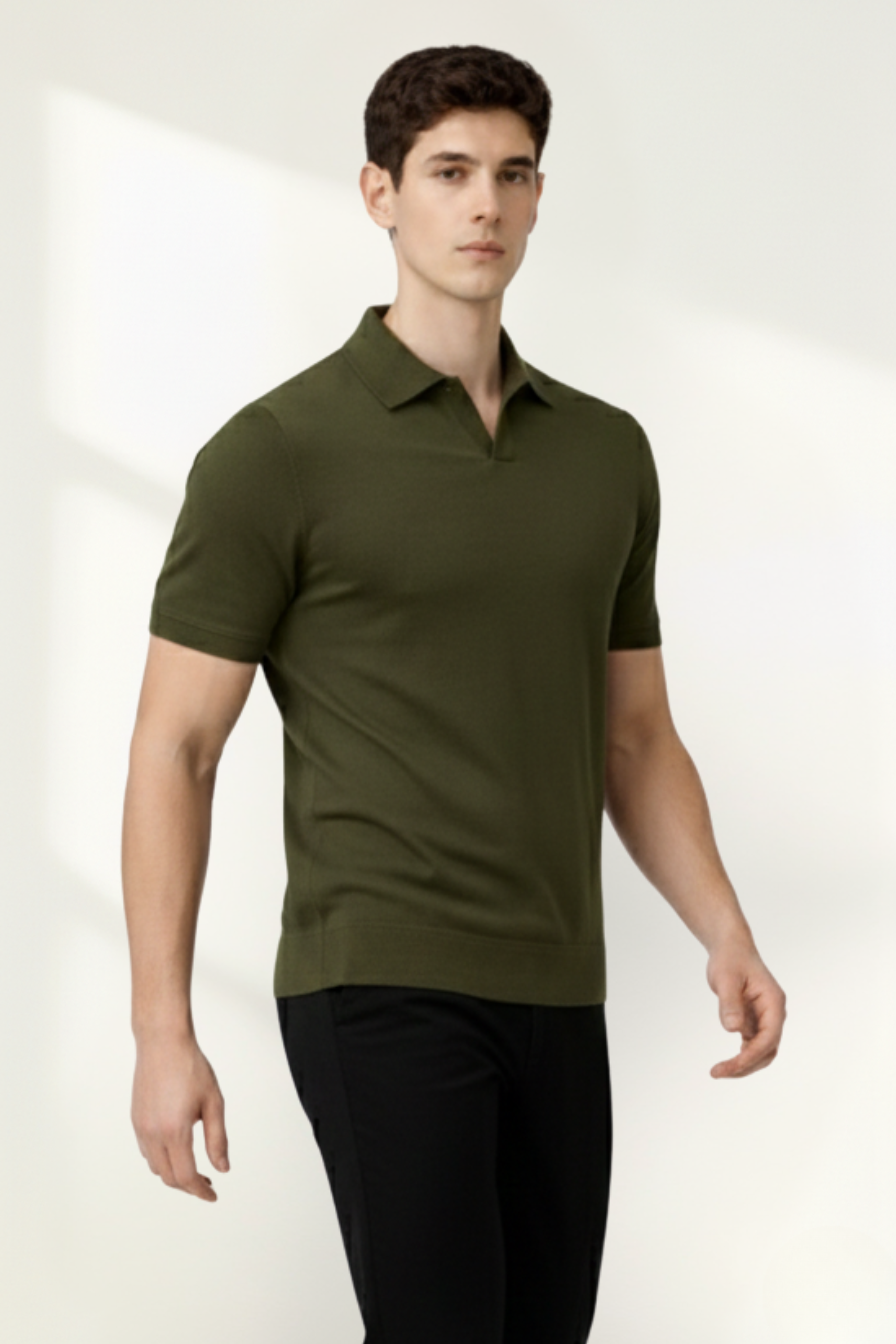 Men's knit polo shirt, side view showing the short sleeve