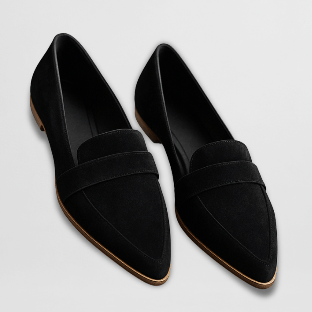 Black slip on loafers with a closed toe, front view