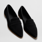 Black slip on loafers with a closed toe, front view