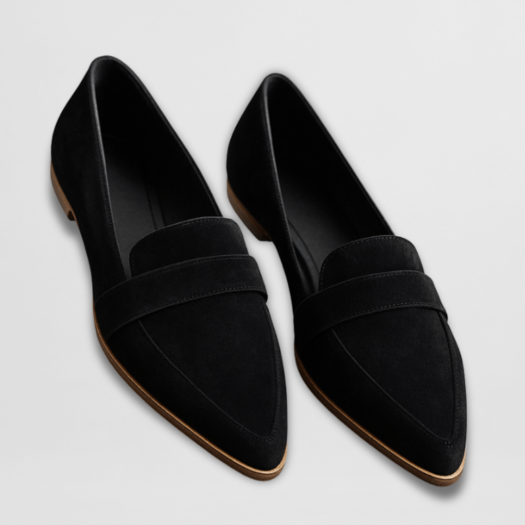 Black slip on loafers with a closed toe, front view