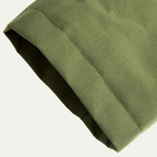 Hooded waterproof raincoat — worn open over a jumper