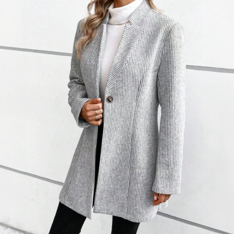 Gray jacquard longline coat, angled view showing the shoulder line and sleeve