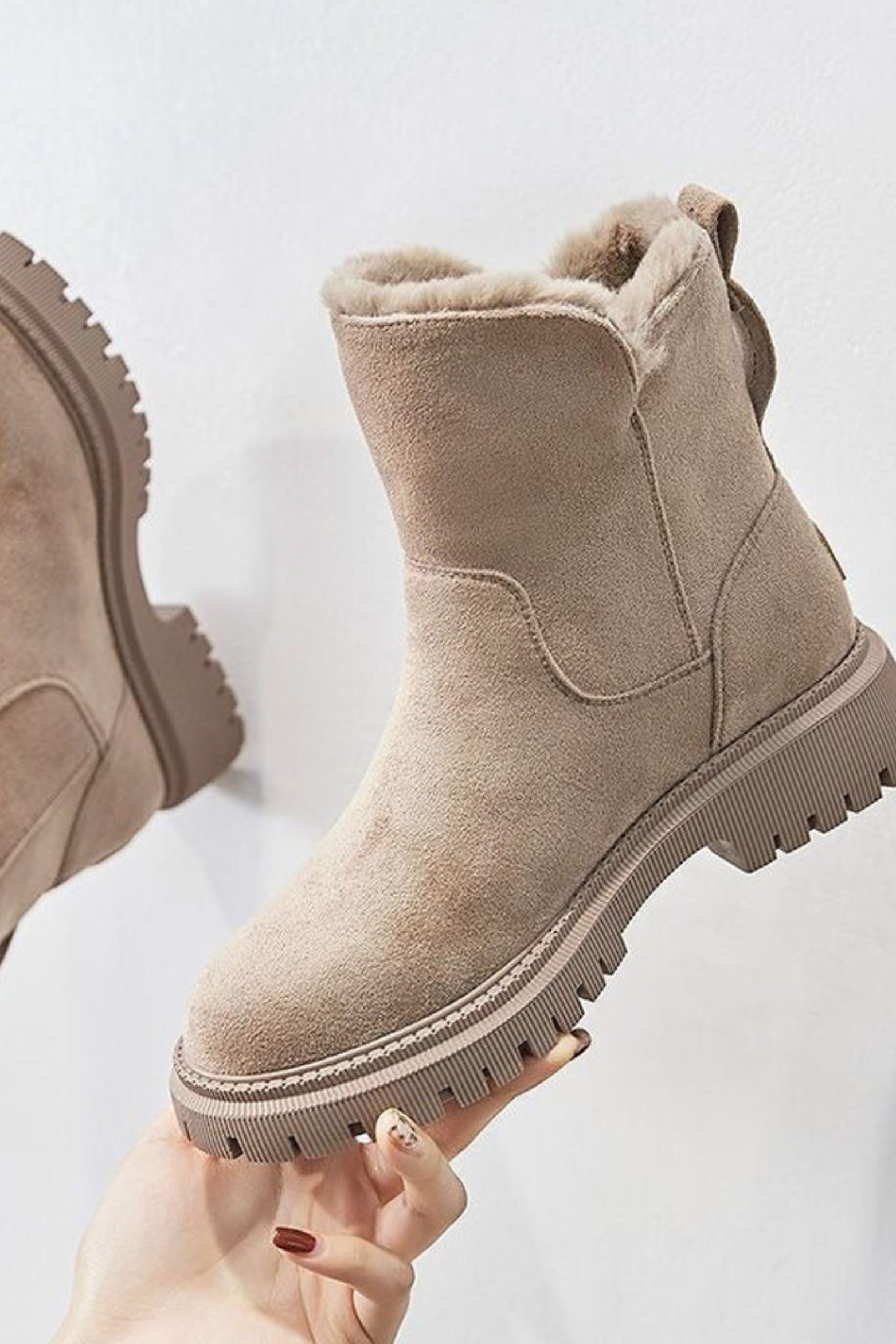 Fleece lined ankle boots for women, close view of the chunky platform and treaded outsole