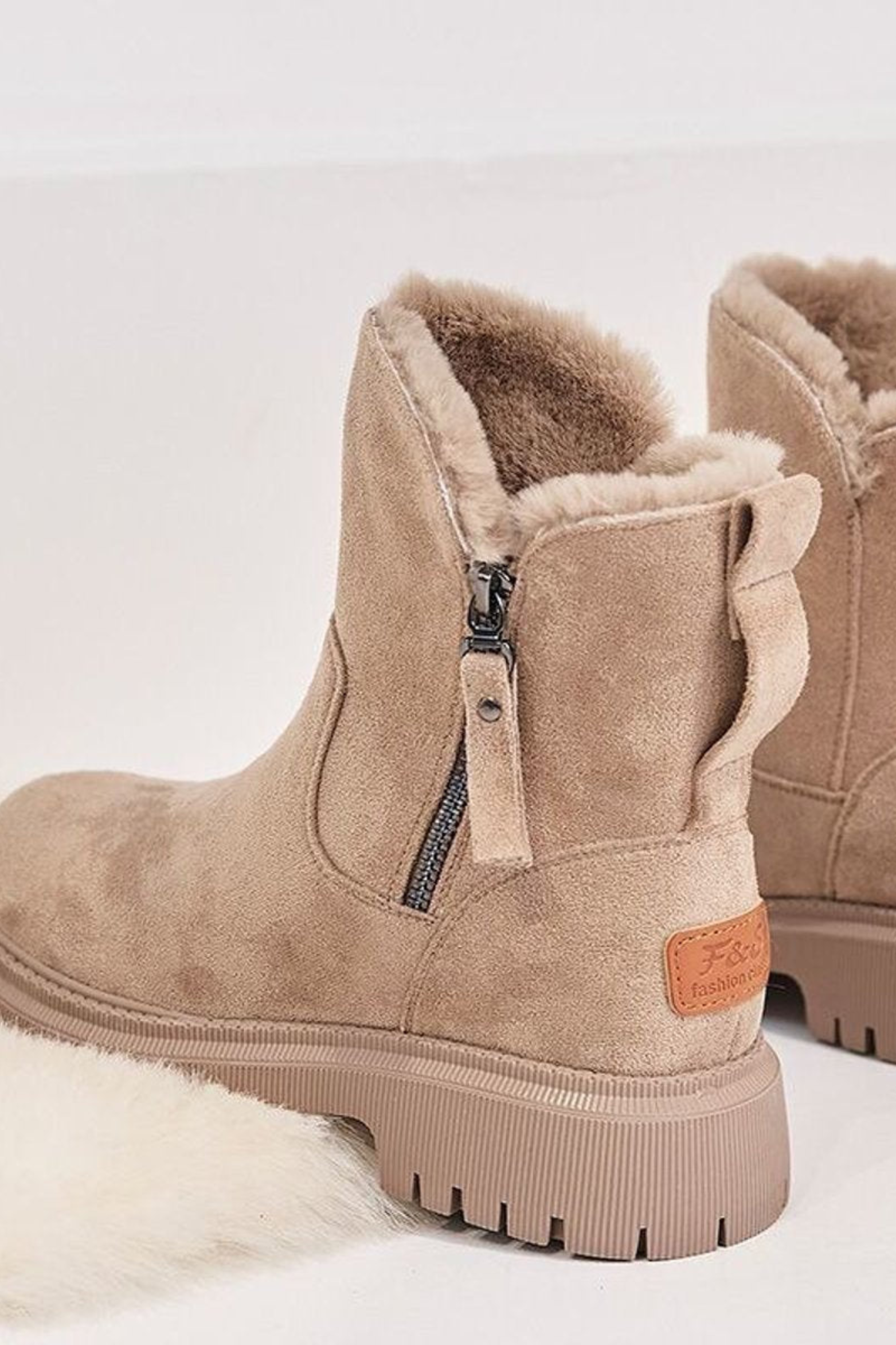 Fleece lined ankle boots for women, view of the plush fleece lining inside the shaft