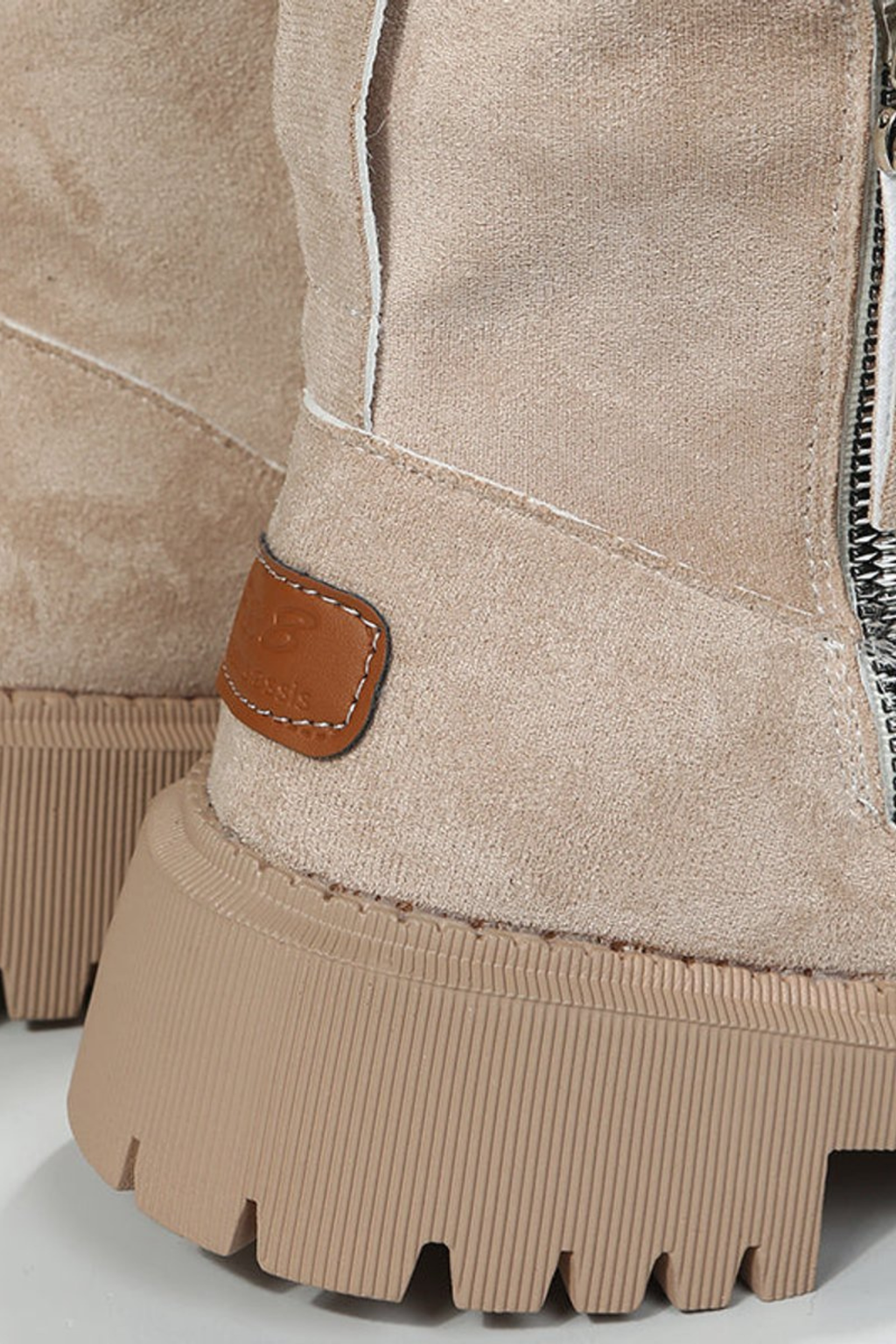 Fleece lined ankle boots for women worn with skinny jeans, styling shot