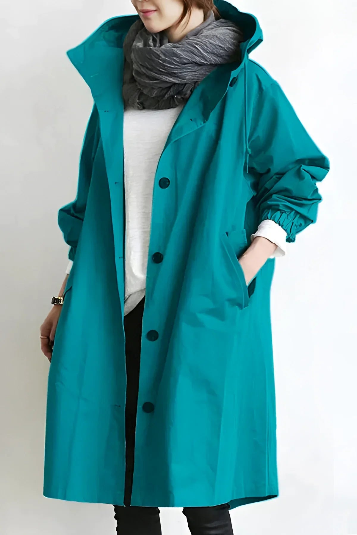 Light blue waterproof raincoat, oversized silhouette