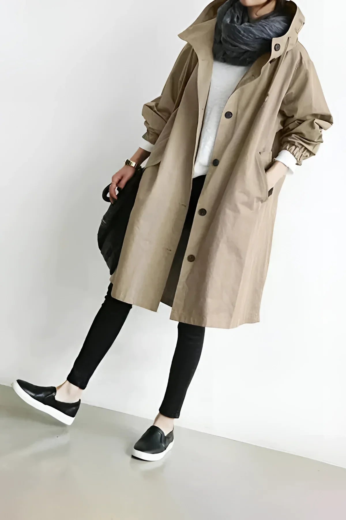 Beige oversized raincoat with elastic cuffs