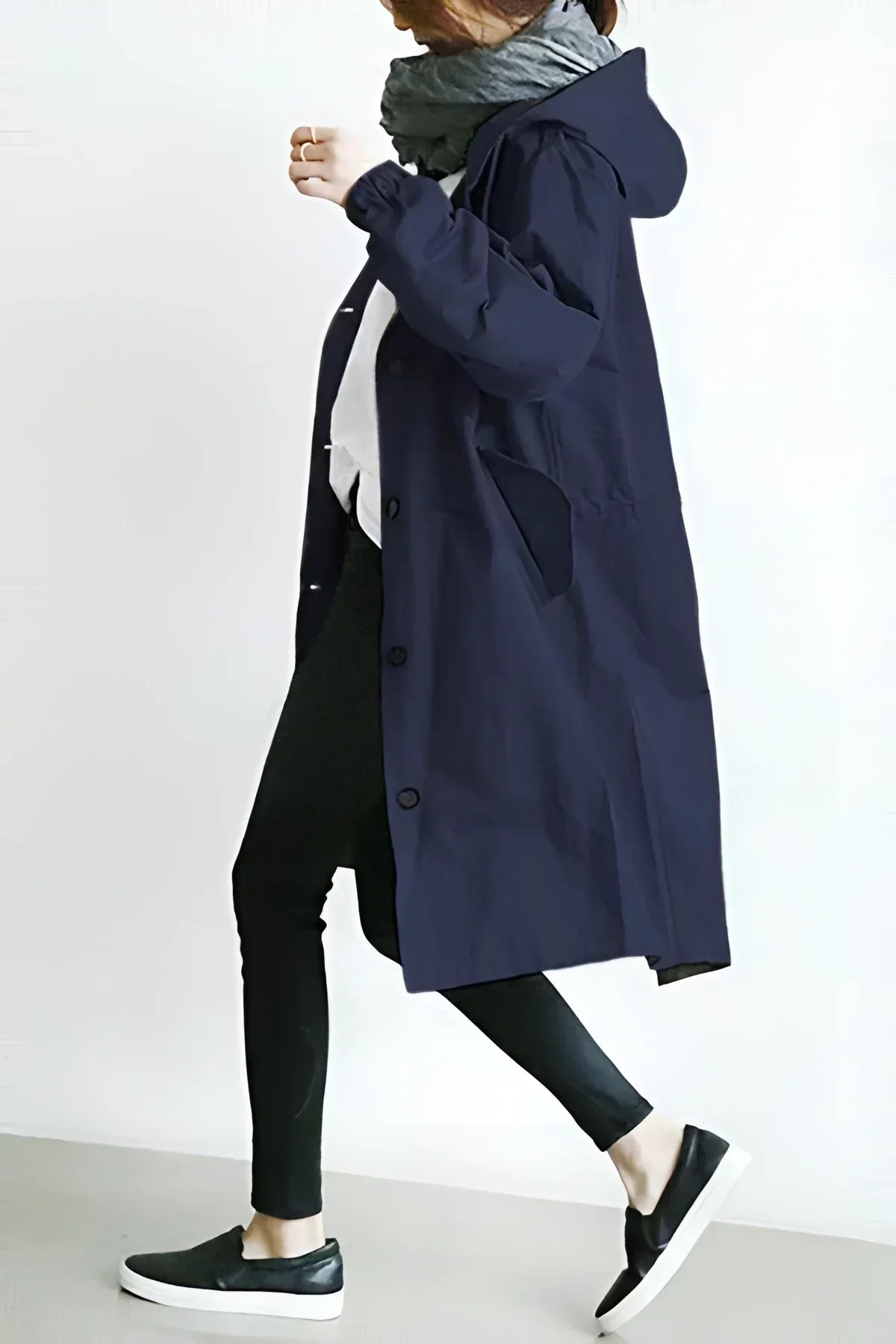 Marine blue raincoat for women, front view with hood up