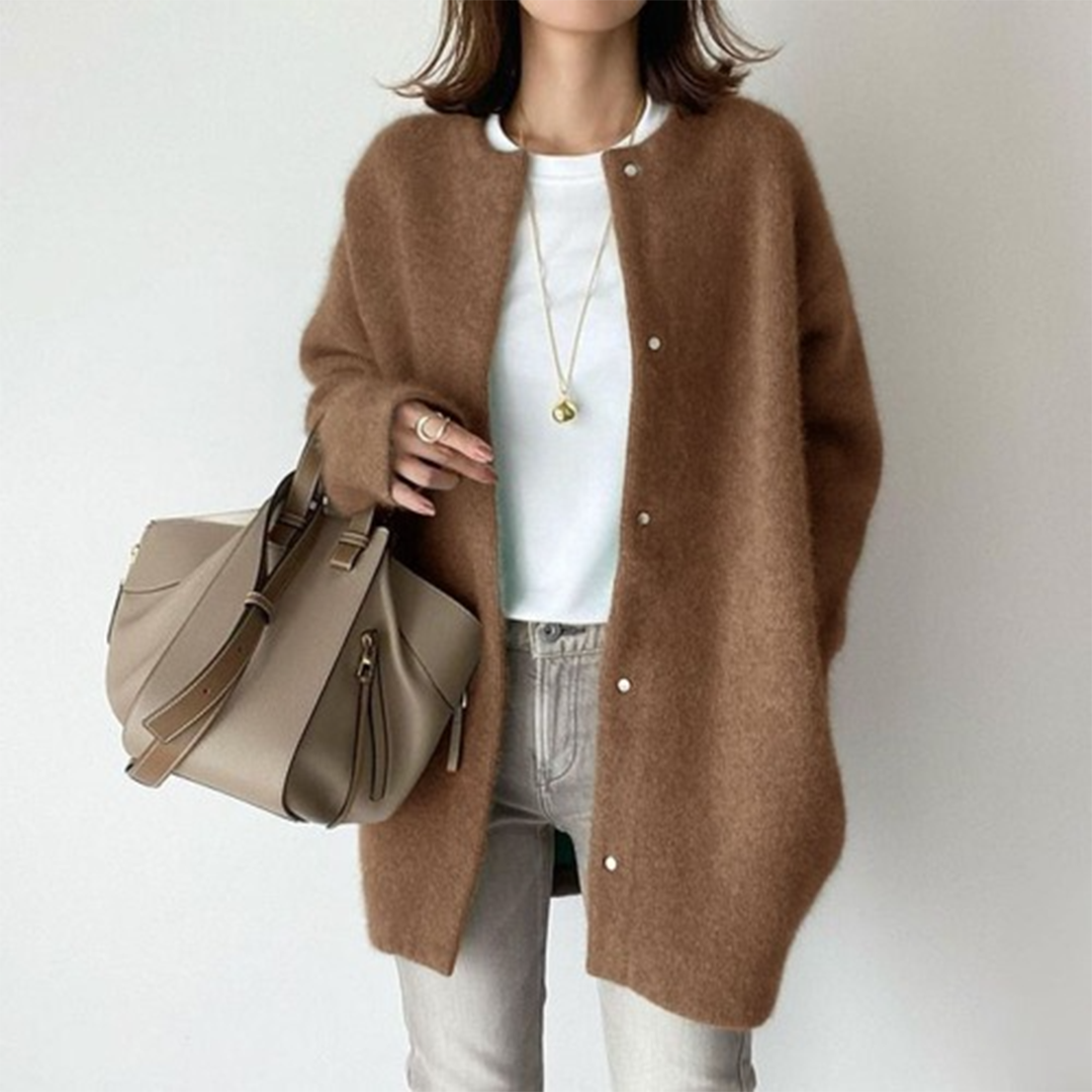 Caramel brown version, sleeves hanging loose from a flat shoulder