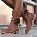 Brown mid calf leather boots for women, side view of the streamlined shaft