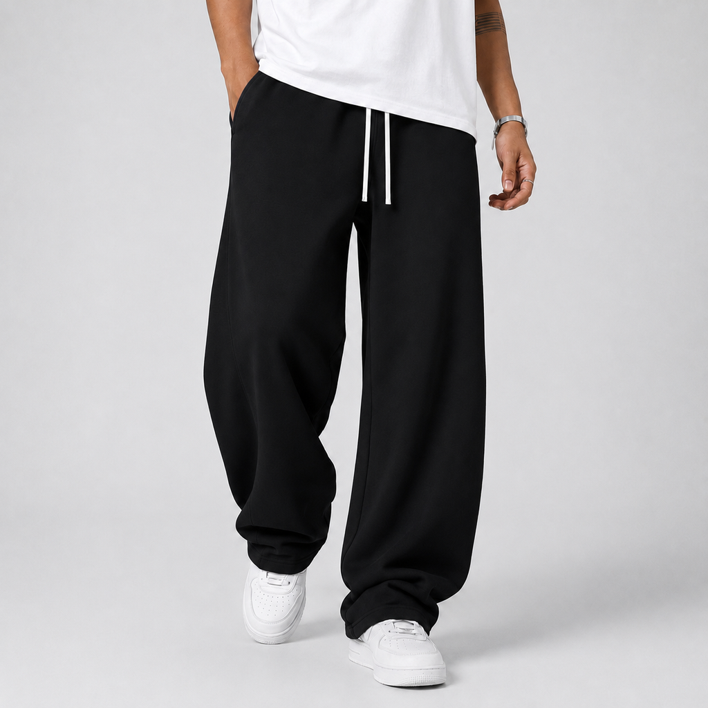 Men's joggers in black, full-length front view with the drawstring waist tied