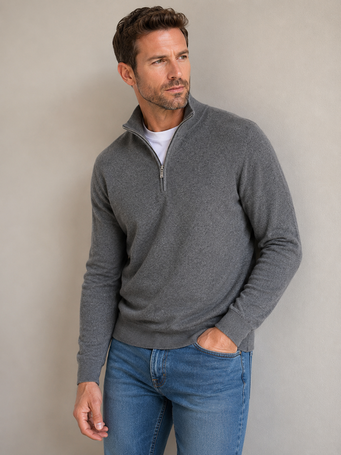 Grey men's half zip sweater, front view with the high collar zipped up
