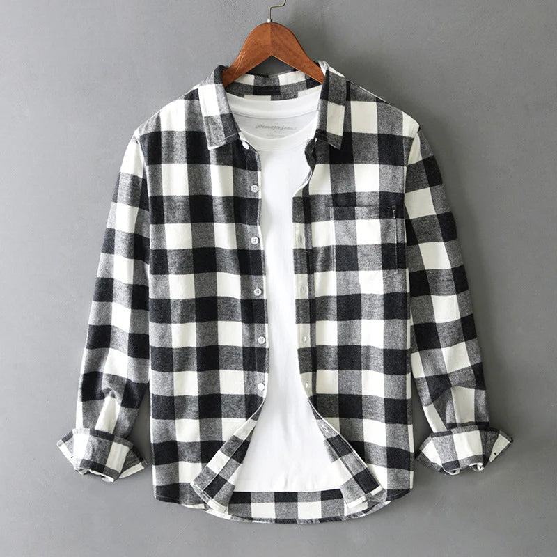 Black check shirt seen straight on, front placket buttoned