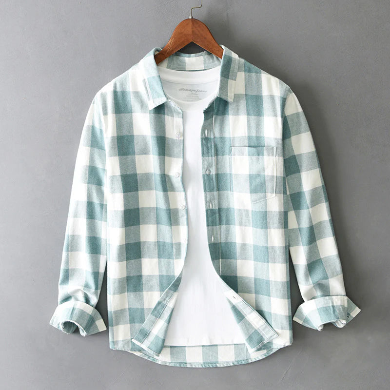 Green check colourway laid flat with sleeves extended