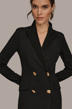 Black double-breasted maxi dress, close-up of the satin against matte crepe