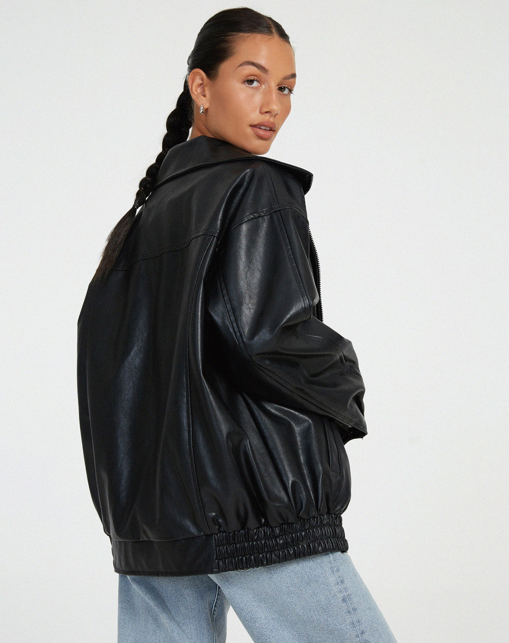 Oversized faux leather bomber jacket — flat lay showing the full shape