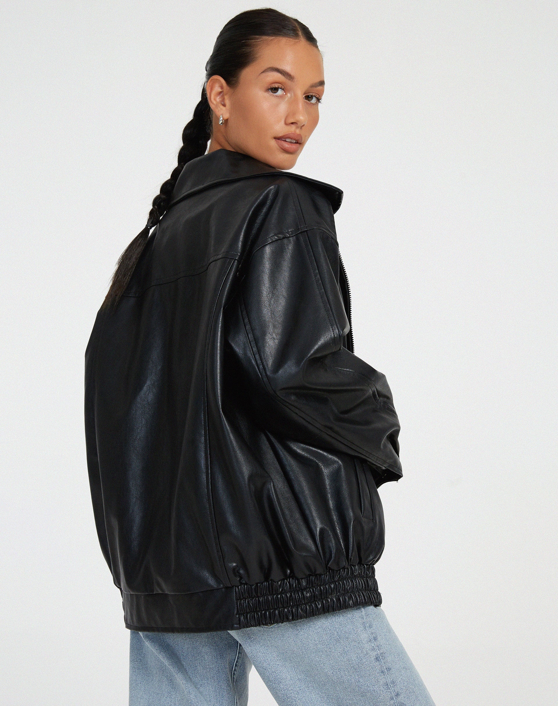 Oversized faux leather bomber jacket — flat lay showing the full shape