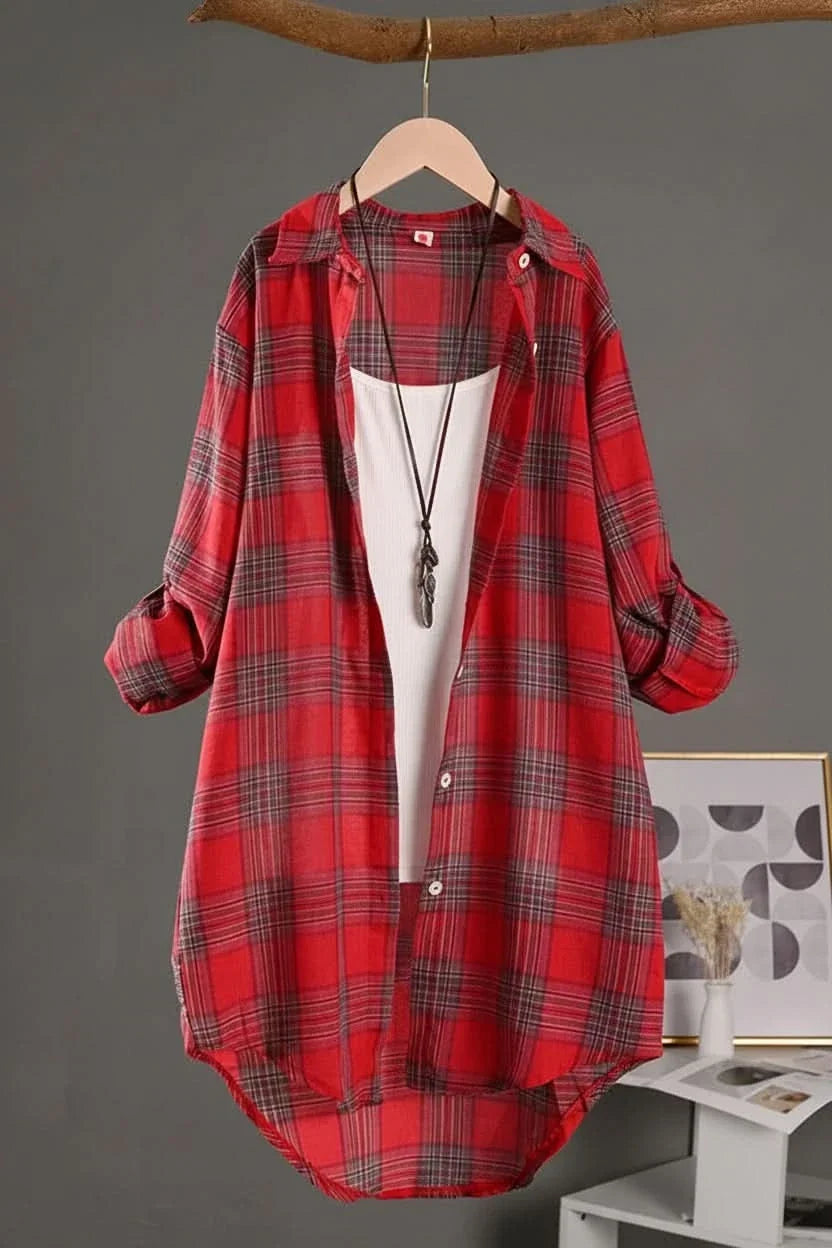 Red plaid flannel shirt worn with the cuffs rolled up