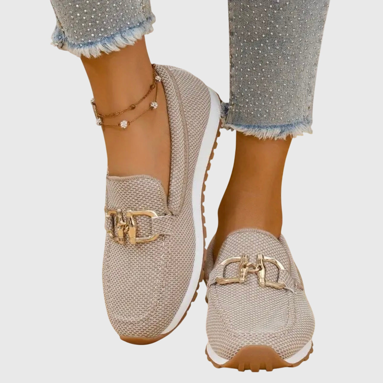 Women's slip-on loafer in Beige, shown against a plain studio background