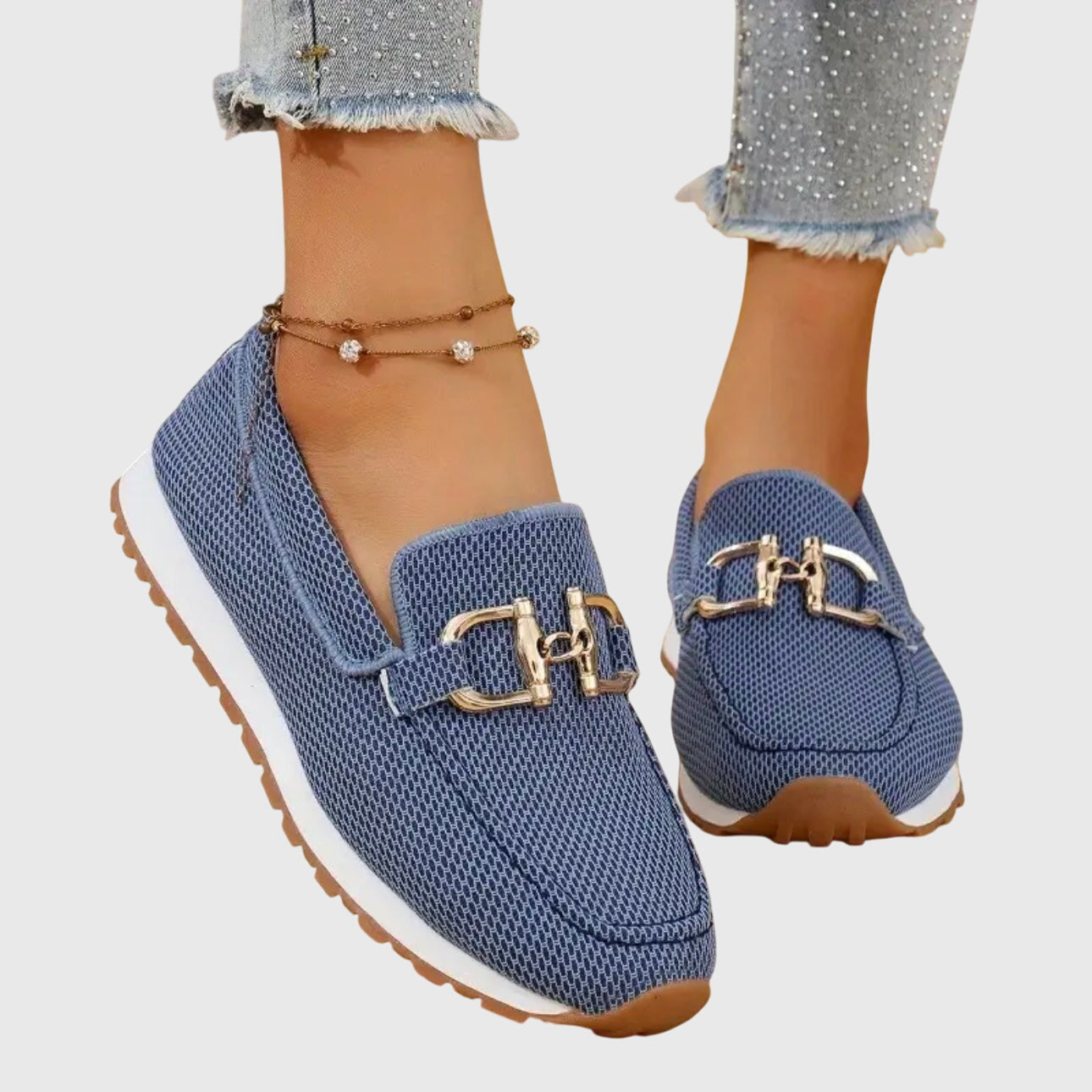 Women's slip-on loafer in Blue, shown against a plain studio background