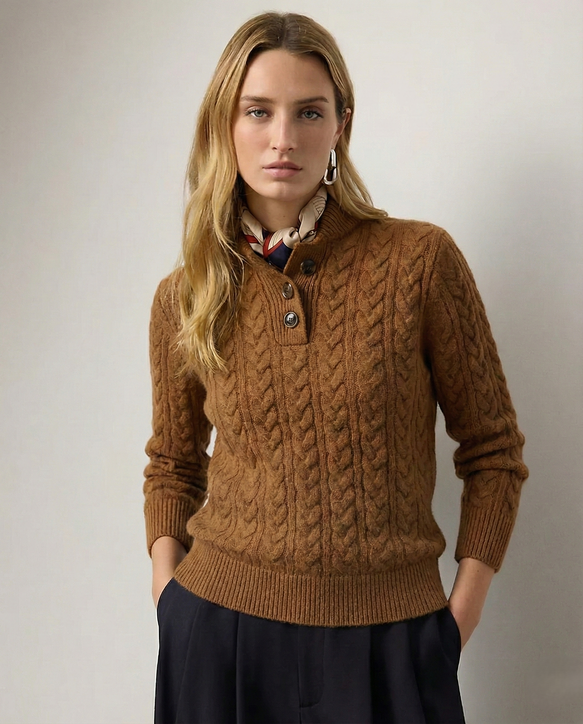 Cable knit cashmere sweater for women, front view with the funnel neck buttoned