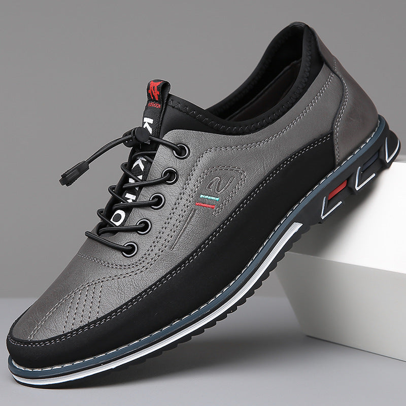 Men's leather dress shoe in Charcoal Gray, shown against a plain studio background