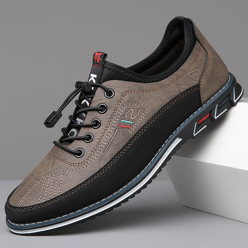 Men's leather dress shoe in Stone Gray, shown against a plain studio background