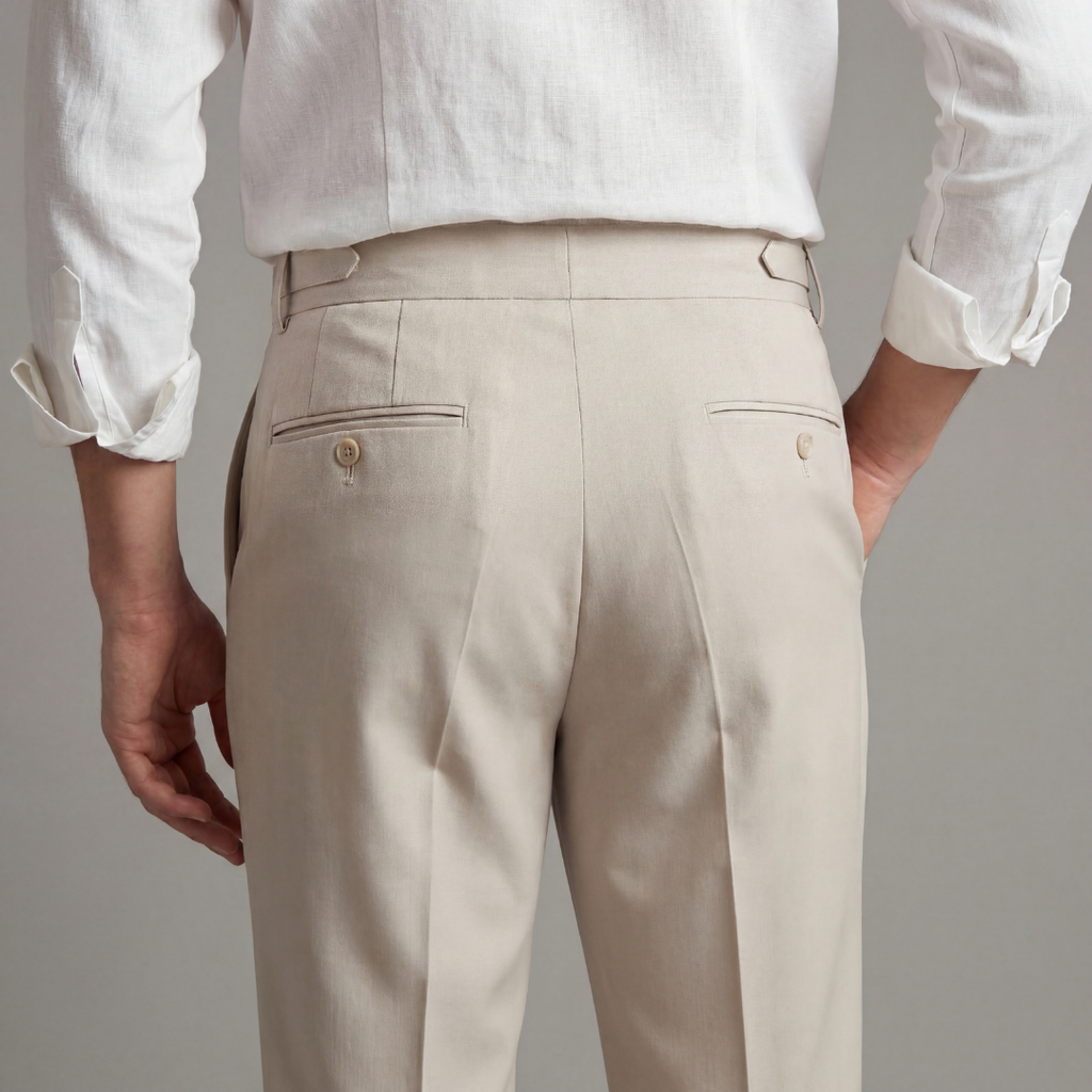 Side view of the men's tailored trousers showing the side pocket and hip line