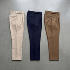 Men's tailored trousers, back view showing the rear pocket and leg line