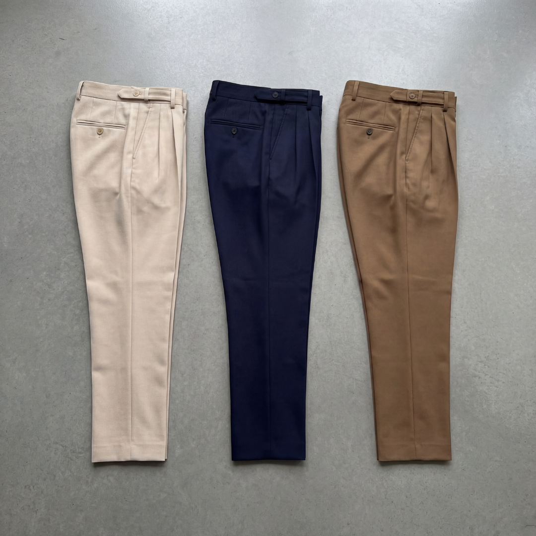 Men's tailored trousers, back view showing the rear pocket and leg line