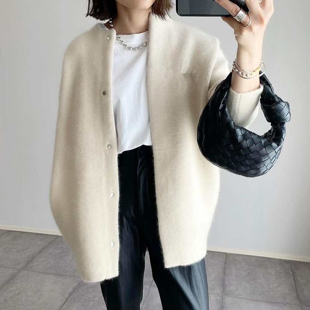 Cardigan worn on the body, showing how it sits over a base layer