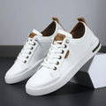 Men's two-tone leather sneakers in white and brown, side view