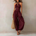 Red halter neck wide leg jumpsuit for women, full-length front view