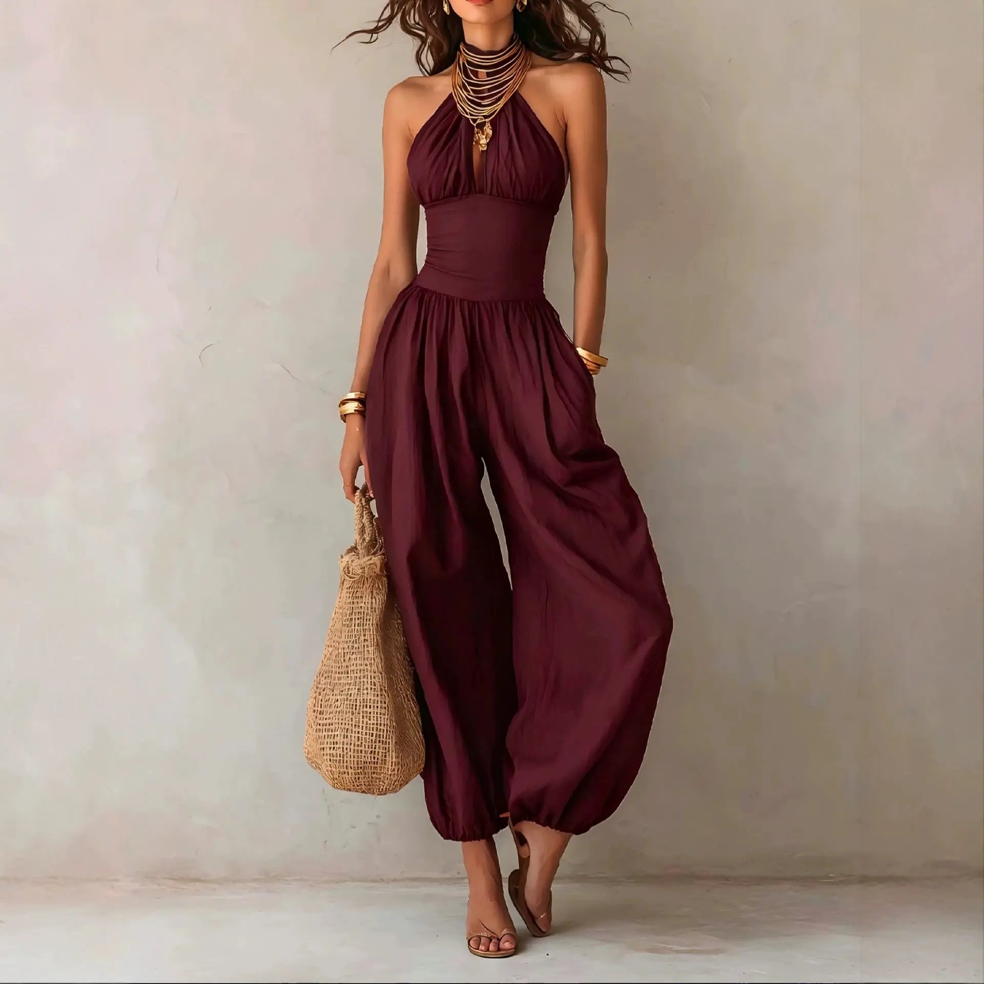 Red halter neck wide leg jumpsuit for women, full-length front view