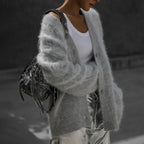 Close view of the fuzzy angora knit and the three-button front