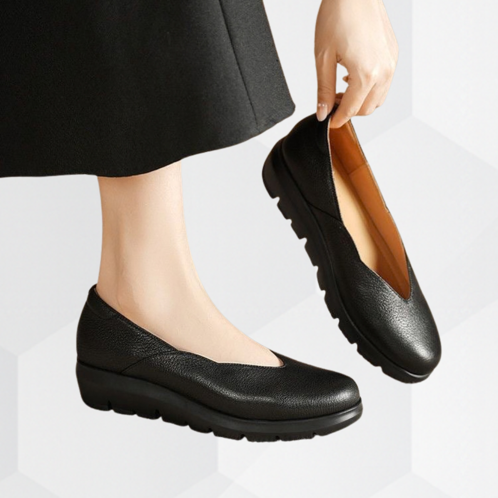 Ballet flats for women worn with trousers, showing the low line across the top of the foot