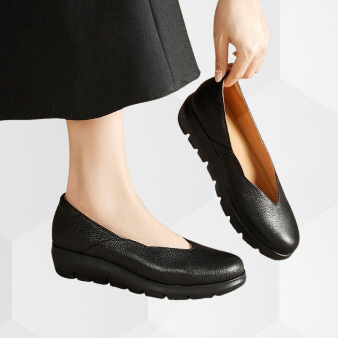 Ballet flats for women worn with trousers, showing the low line across the top of the foot