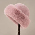 Wool winter hat for women in pink, front view of the plain knit shape