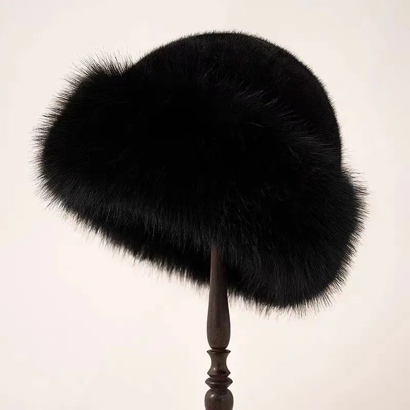 Wool winter hat for women in black, worn with a winter layer