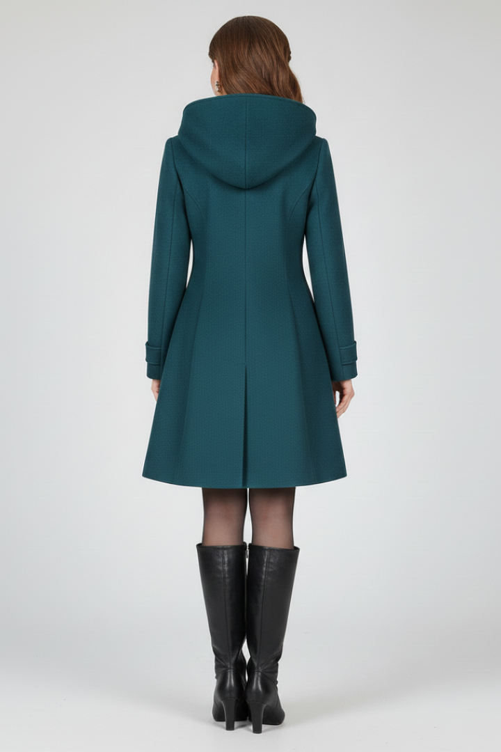 Hooded coat for women, detail of a flap hip pocket and long sleeve cuff
