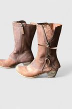 Brown distressed leather ankle boots, front view showing the rounded toe