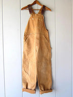 Back view of the wide leg overalls showing the strap crossover