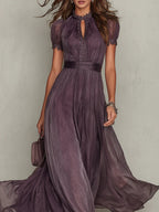 Purple chiffon maxi dress, side view showing the long loose skirt