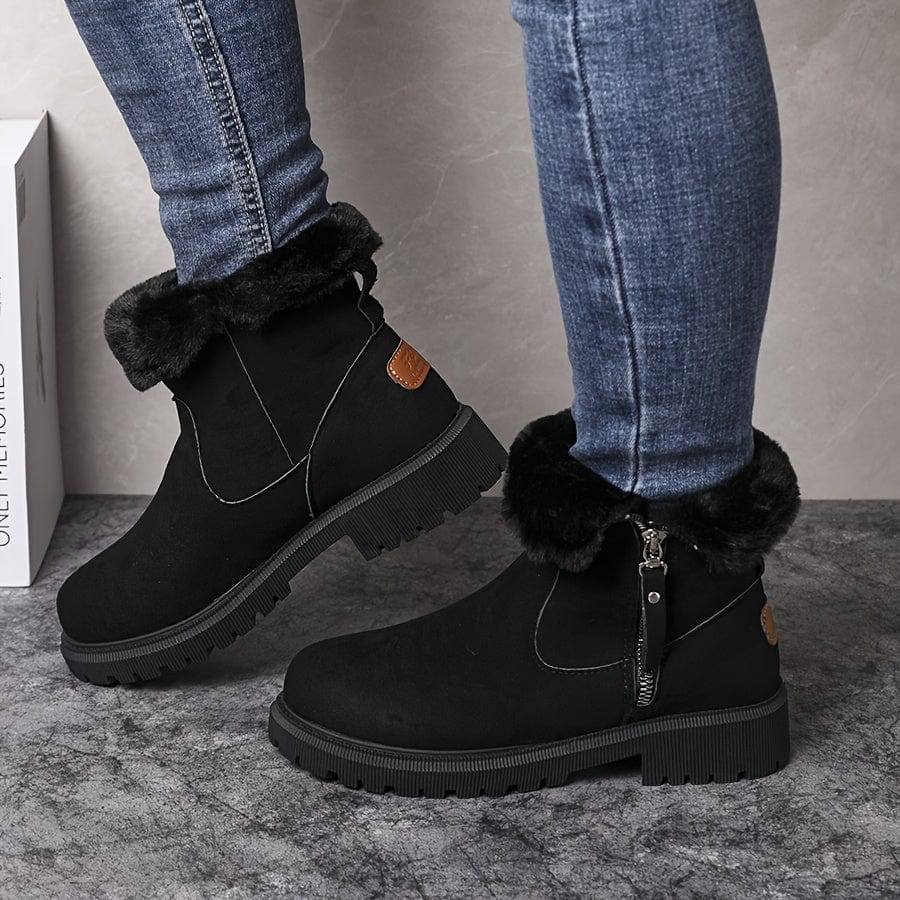 Black lug sole ankle boots for women, side view