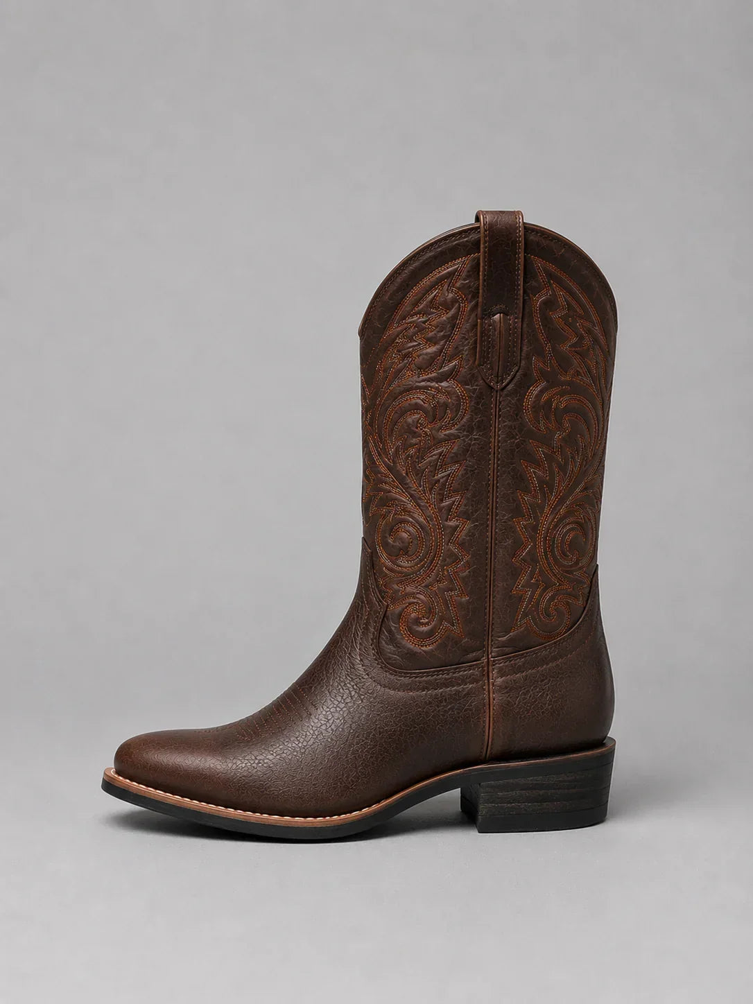 Brown embroidered western boot, viewed from behind at the heel counter