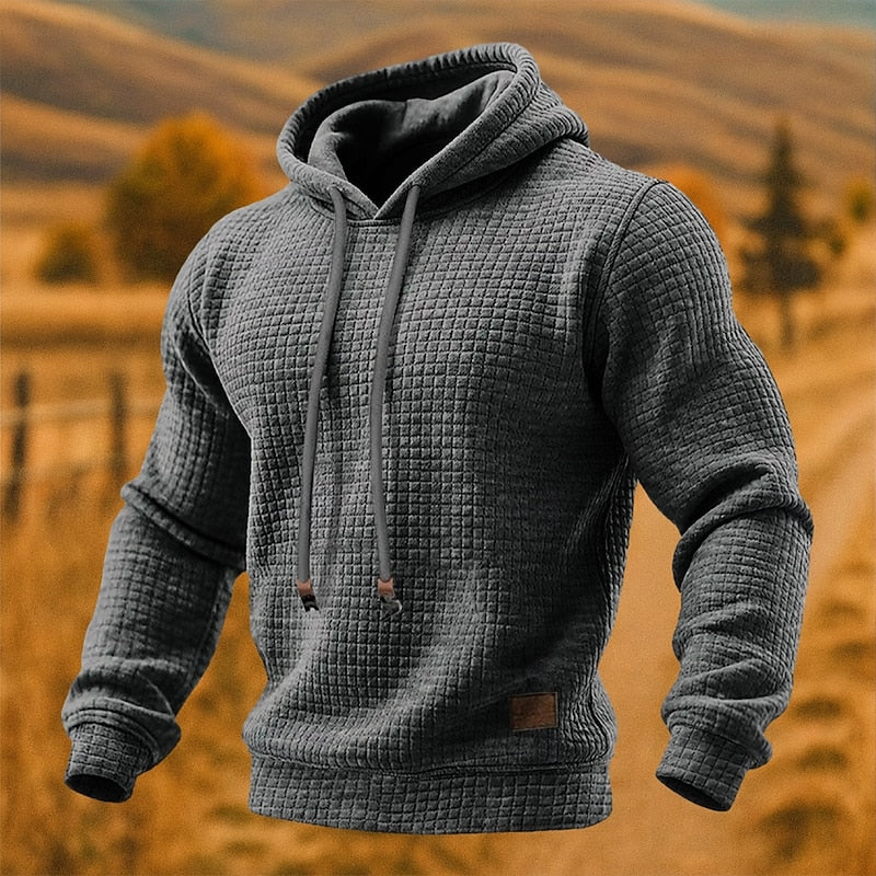 Close view of the waffle knit texture and the drawcord hood